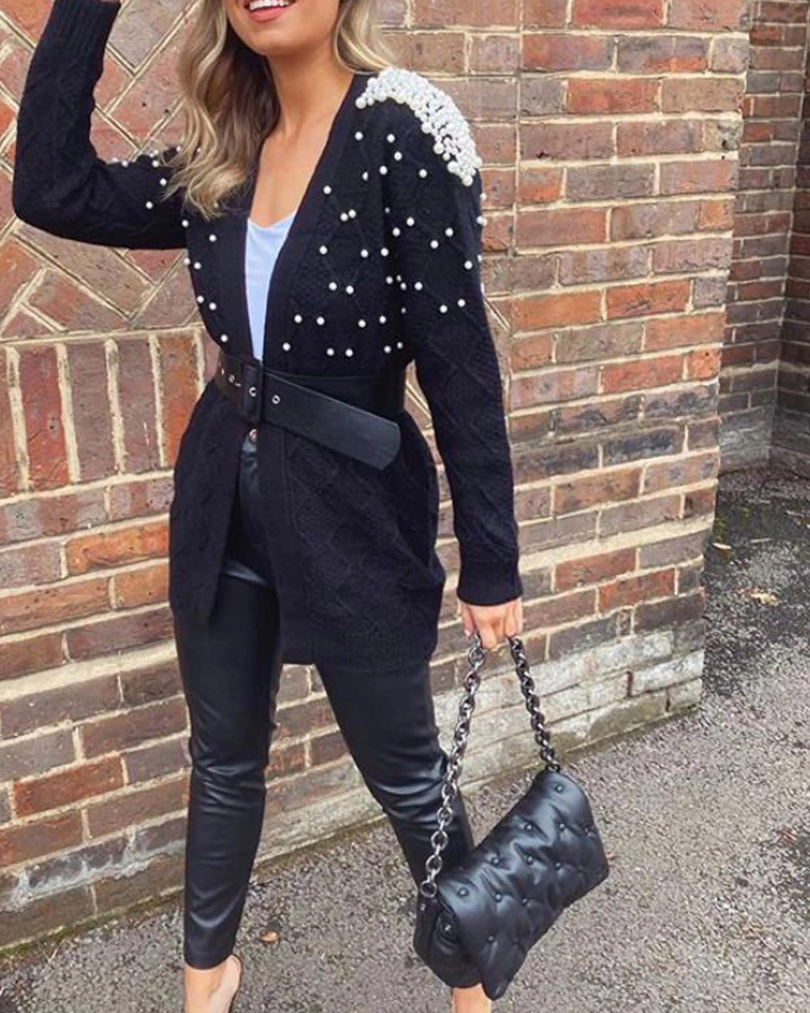 Cardigan with pearl embellishment on shoulder in black